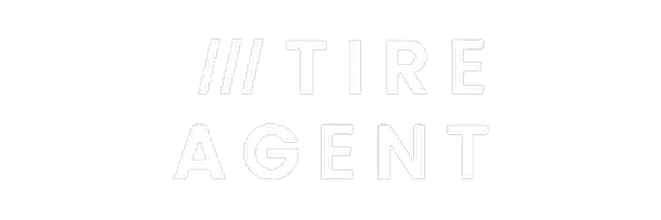 The image features the words TIRE AGENT in bold, capital letters with three diagonal slashes before the word TIRE, all in a minimalist white on gray design.